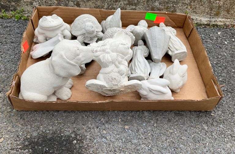 Small assortment of concrete figurines.  Turtle frogs, angels, dog seashells, hedgehog, rabbit.  Tallest piece  is 6 inches