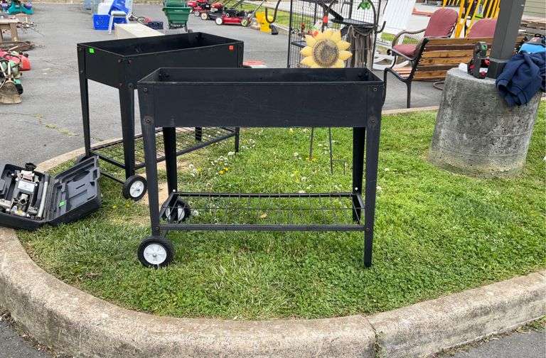 Metal planter with under shelf 37 X 15.5 baths 31 inches tall.