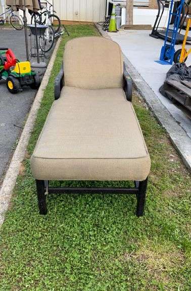 Castellen cahise lounge,metal frame, sunbrella back/bottom cushions, right leg does have an inward bend, and a small hole in bottom cushion and some stains on cushions