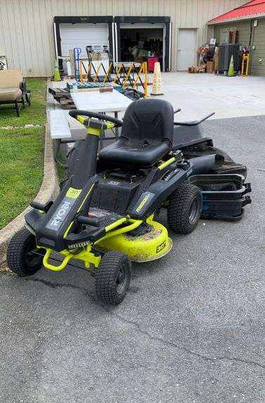 Ryobi 48v riding mover with bagging system, 30” cut deck, key is a little bent but mower runs as it should. Has no charger.
