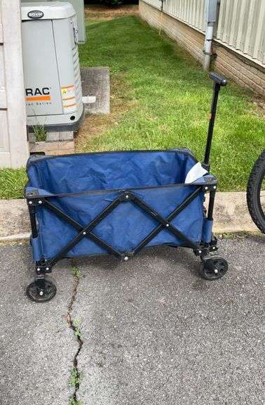 Cloth wagon, foldable, extension pole, some cosmetic damage and scuffs on wagon