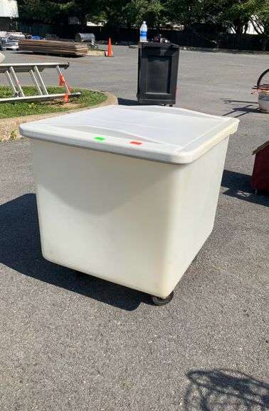 Rolling poly bin, 17”H x 24”L x 21”W, some cracks on rim