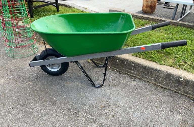 John Deere green wheelbarrow, two handle with poly grip, 36”L x 24”W, ready to use condition