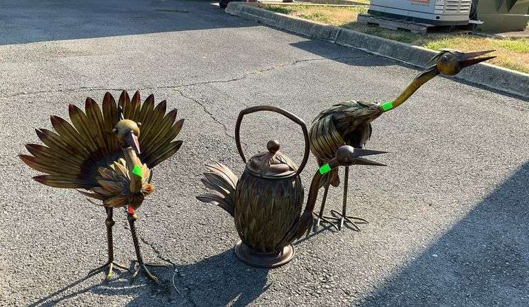 Two metal bird sculptures 20 and 24”H, metal bird watering can, decorative purposes only, doesn’t actually pour water