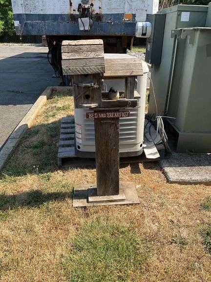 Birdhouse, wooden, 42”H, doesn’t stand very well on own