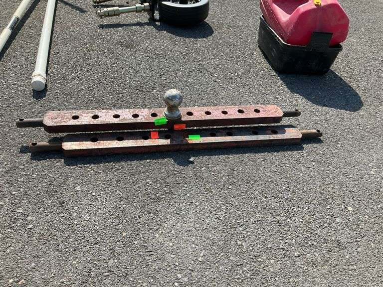 Two tow bars and one 2” ball