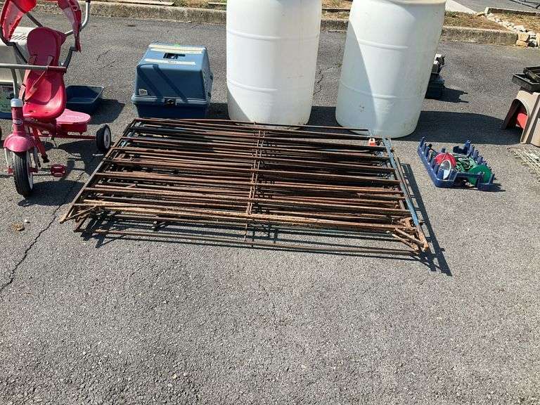 Metal slatted rail/wall, nine panels, 40”H x57”L some rust holes on all panels