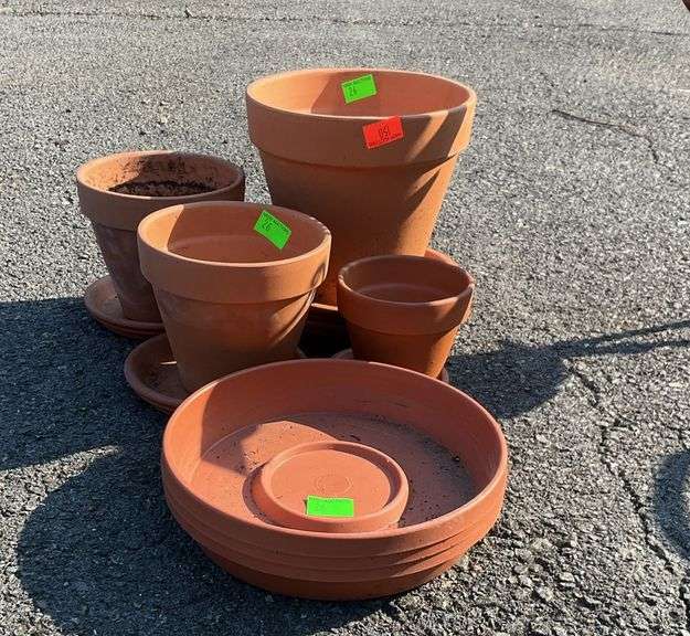 Clay planters with plates, and two plates
