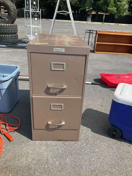 Filing cabinet, metal, with some office supplies