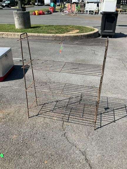 Four tier wire shelf unit, 31”H x 26”L x 9”W, some rust