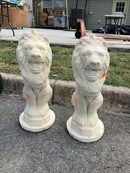 Pair of concrete lion sculptures, 20”H