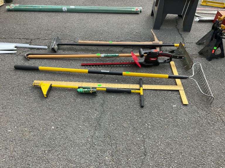 Long handle tool lot, pick axe, gravel rake, thatcher, drywall square ...