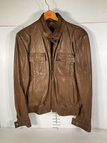 Men’s chocolate leather jacket with built in hood. Appears to be medium ...