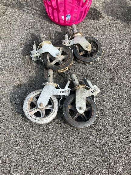 Four Heavy Duty 8-Inch Diameter Casters, One Missing Rubber Coating