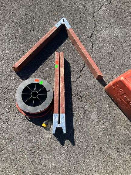 Sawhorse Legs and Extension Cord Reel with Damaged Cord