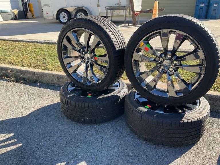 Four Dodge Challenger SRT Wheels with 245/45ZR20 Tires