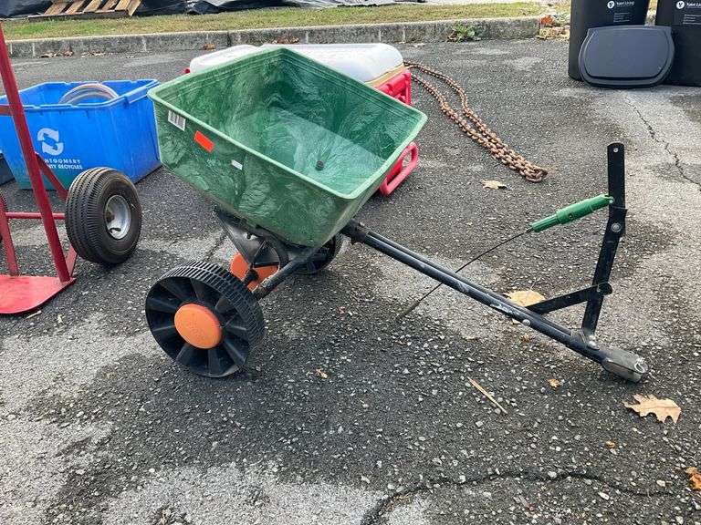 Scotts Tag-Along Broadcast Seed Spreader with Plastic Hopper and Metal Frame