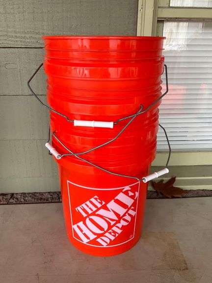 Four 5-Gallon Orange Plastic Buckets with Handles