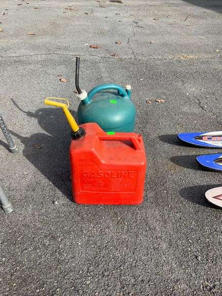 Two Five-Gallon Plastic Fuel Cans