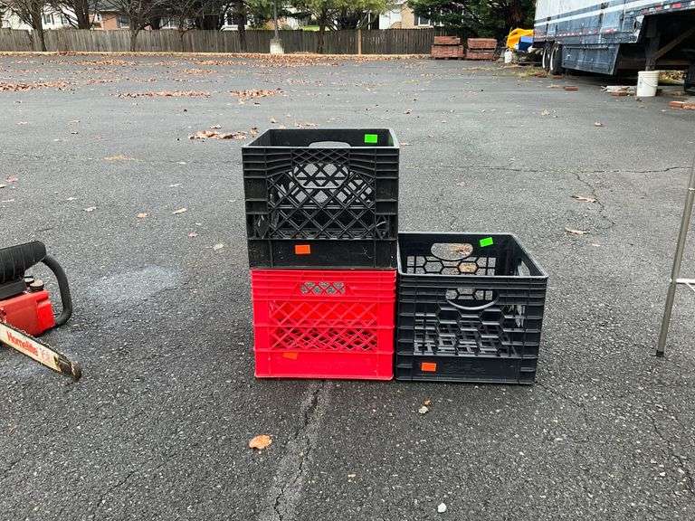 Three Plastic Vented Crates in Black and Red