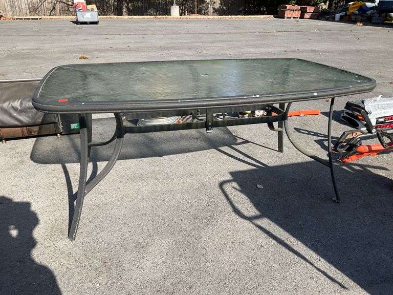 Glass Top Patio Table with Metal Frame, 65”x40” - Hash Auctions