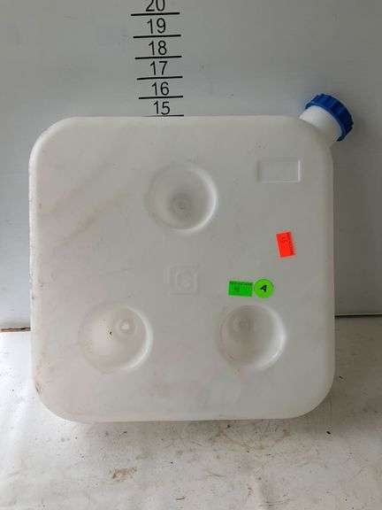 White Plastic Container with Blue Screw Cap and Embossed ‘G’ Marking