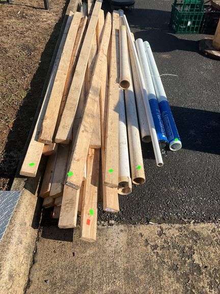 Mixed Lot of Lumber and PVC Pipe in Various Lengths