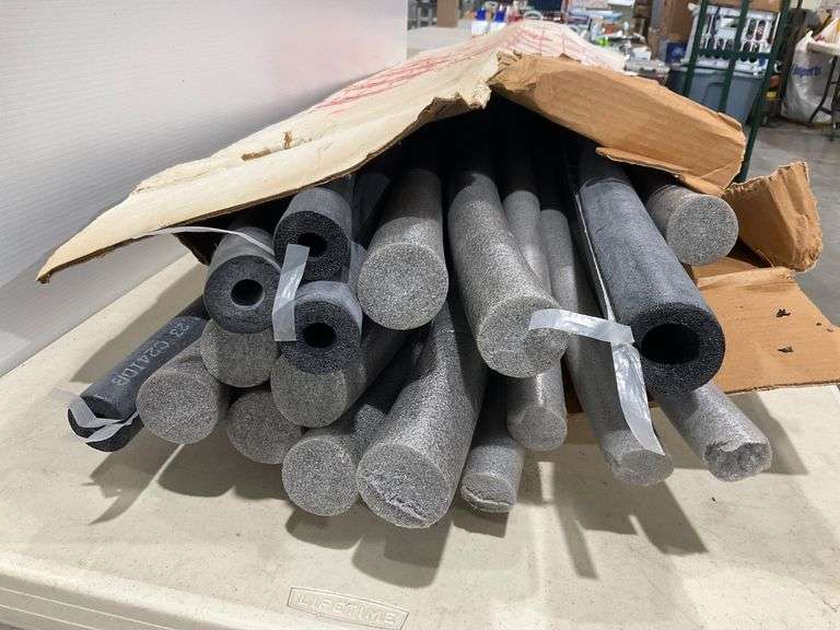 Bundle of Foam Pipe Insulation Tubes and Solid Foam Tubes of Varying ...