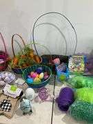 Assorted Easter Decorations and Accessories Including Baskets, Eggs, and More