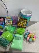 Assorted Easter Decorations and Accessories Including Baskets, Eggs, and More