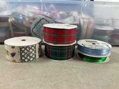 Plastic Storage Bin Containing Assorted Ribbon Spools