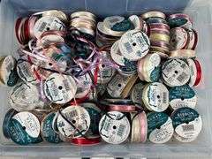 Plastic Storage Bin Containing Assorted Ribbon Spools