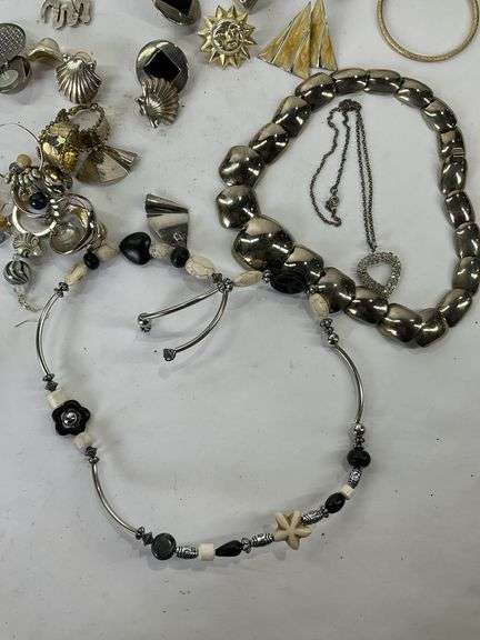 Costume jewelry to include earrings and  necklaces
