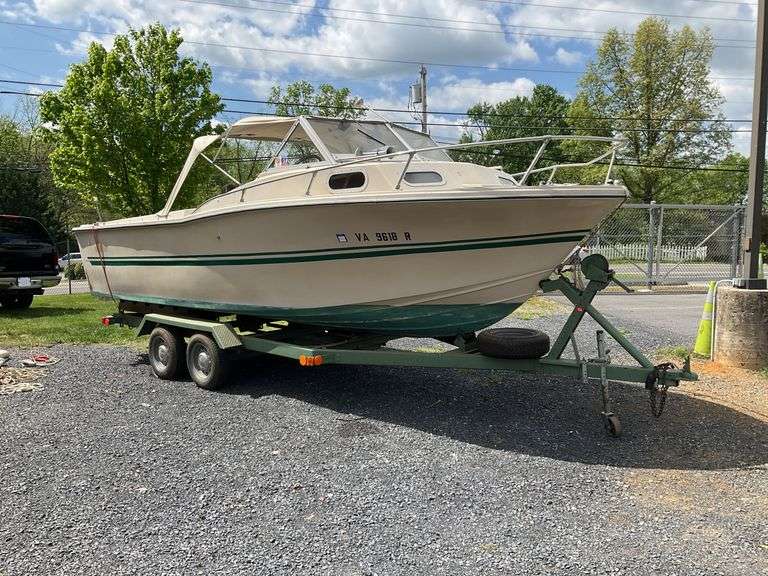 1972 Cruiser 21 foot Boat, with a 1971 Dill Boat Trailer. Virginia Certificate of Title to Vessel and Title to the Trailer. Evinrude 175hp outboard.
