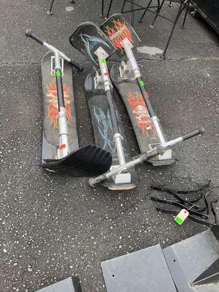 Three Snow Kick Scooters with Flame and Dragon Graphics