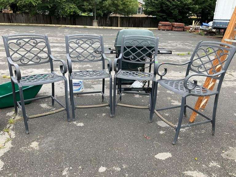 Four Aluminum Patio Arm Chairs with Lattice and Scrollwork Design