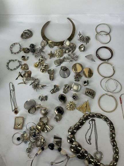 Costume jewelry to include earrings and  necklaces