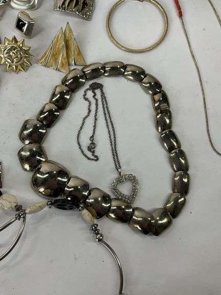 Costume jewelry to include earrings and  necklaces