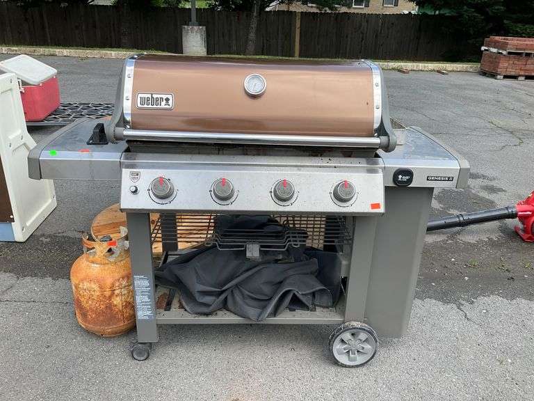 Weber Four-Burner Propane Grill with Tank - Hash Auctions