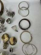 Costume jewelry to include earrings and  necklaces
