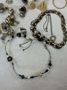 Costume jewelry to include earrings and  necklaces