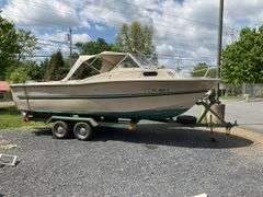 1972 Cruiser 21 foot Boat, with a 1971 Dill Boat Trailer. Virginia Certificate of Title to Vessel and Title to the Trailer. Evinrude 175hp outboard.