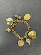 1974 charm bracelet goldtone
