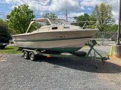 1972 Cruiser 21 foot Boat, with a 1971 Dill Boat Trailer. Virginia Certificate of Title to Vessel and Title to the Trailer. Evinrude 175hp outboard.