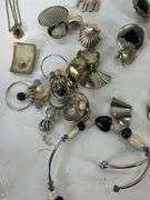 Costume jewelry to include earrings and  necklaces