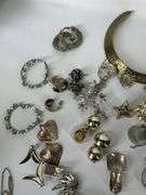 Costume jewelry to include earrings and  necklaces