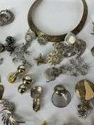 Costume jewelry to include earrings and  necklaces