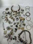 Costume jewelry to include earrings and  necklaces