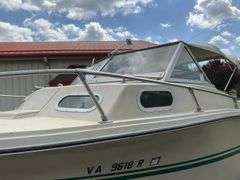 1972 Cruiser 21 foot Boat, with a 1971 Dill Boat Trailer. Virginia Certificate of Title to Vessel and Title to the Trailer. Evinrude 175hp outboard.