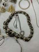 Costume jewelry to include earrings and  necklaces